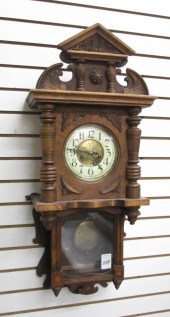WALNUT CASED WALL CLOCK, GUSTA