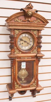 WALNUT CASED WALL CLOCKWALNUT