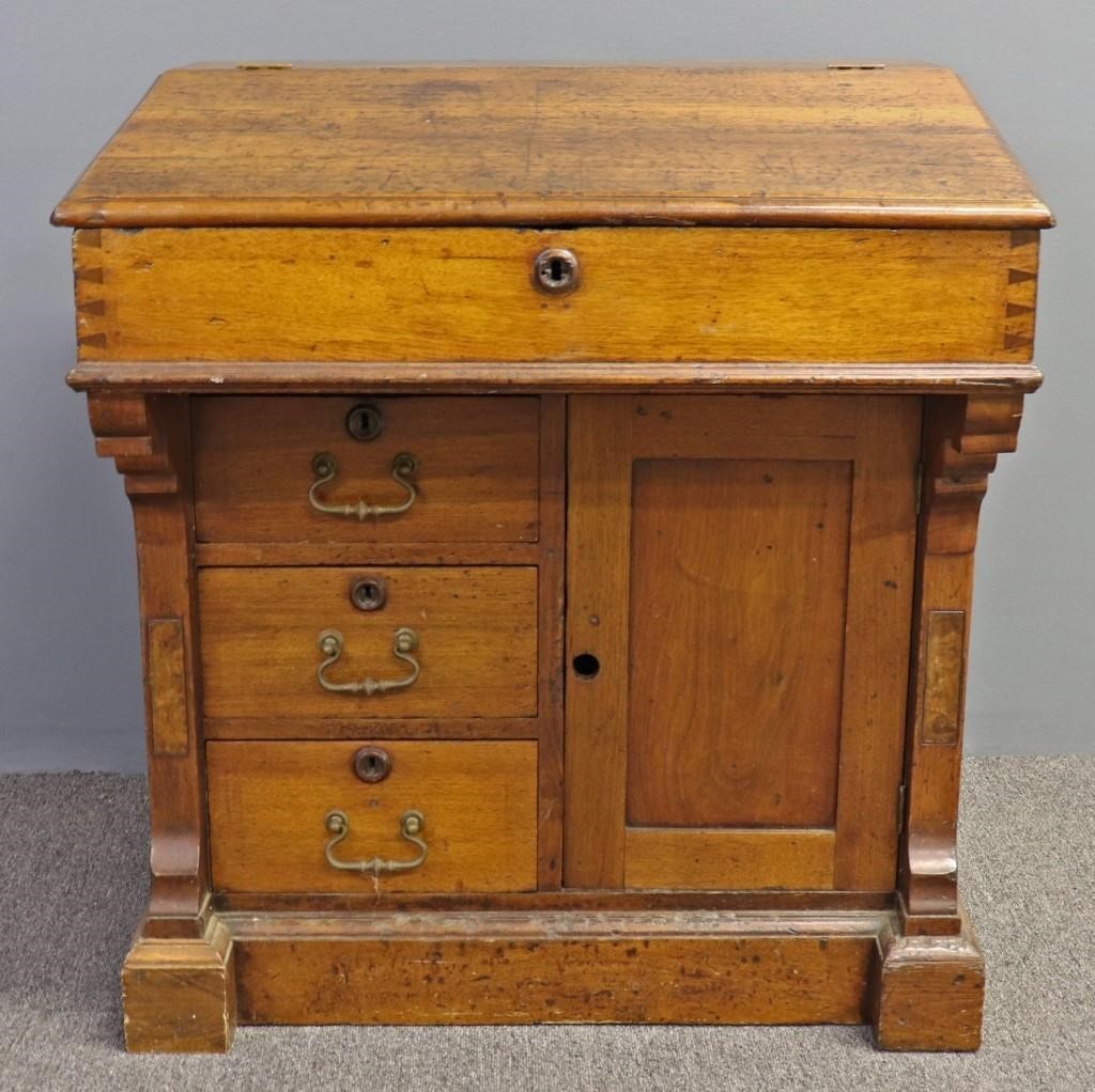 Walnut Davenport slant-lid desk,