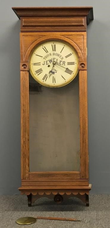 Walnut hanging advertising clock,