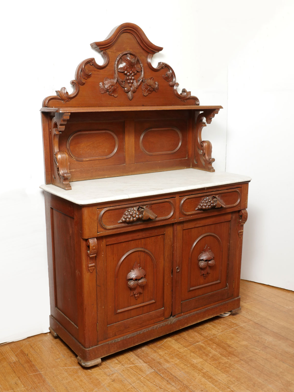 WALNUT MARBLE TOP BUFFET: Carved