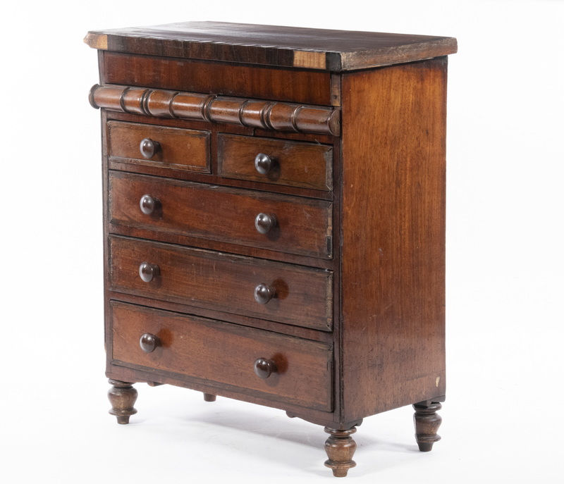 WALNUT MINIATURE SEVEN-DRAWER CHEST