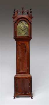 Walnut tall clock    works by