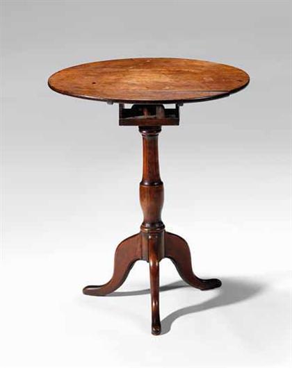 Walnut tilt-top candlestand   