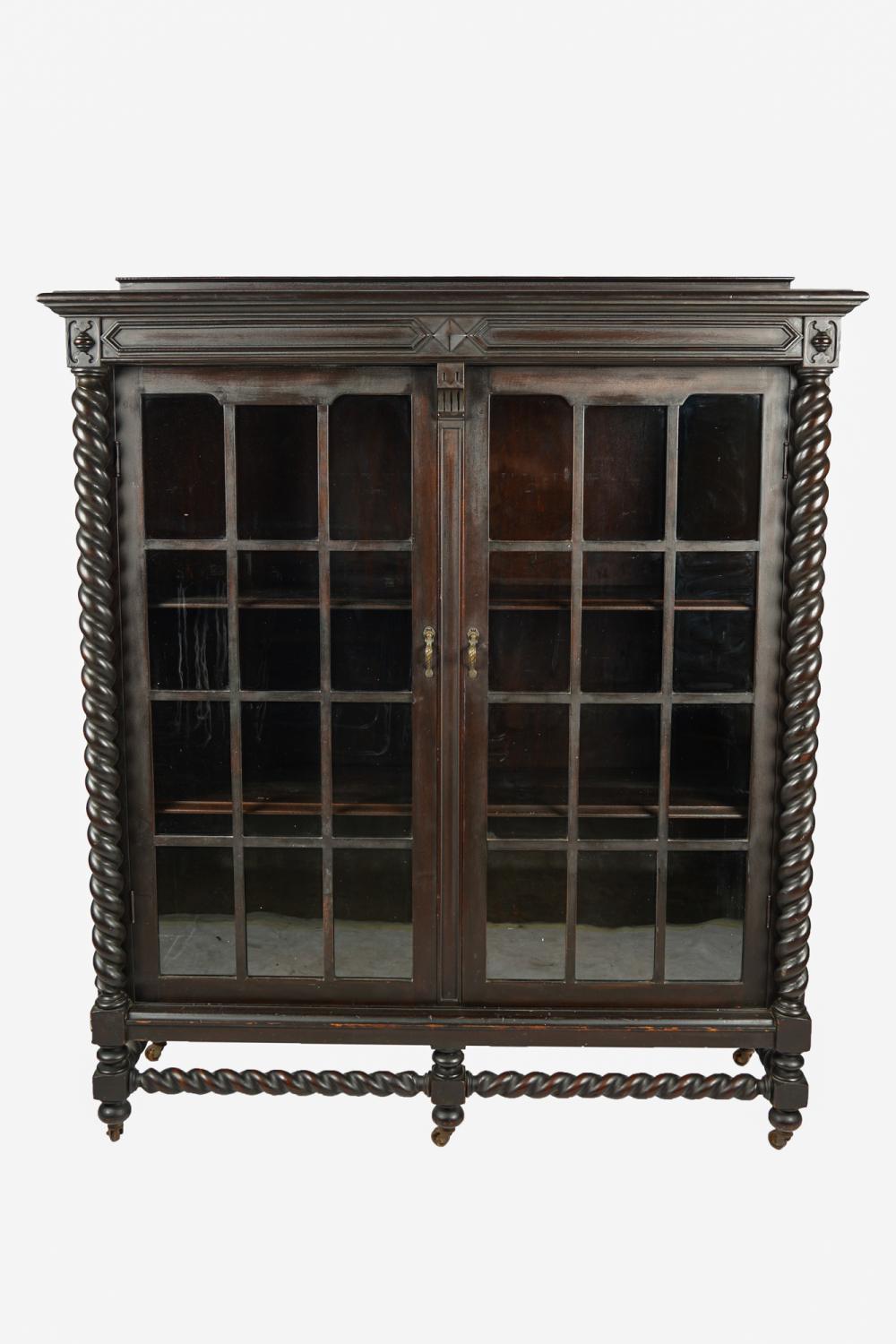 WALNUT TWO-DOOR BOOKCASEcirca