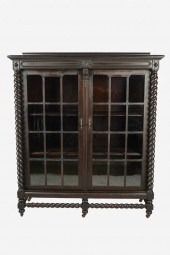 WALNUT TWO-DOOR BOOKCASEcirca