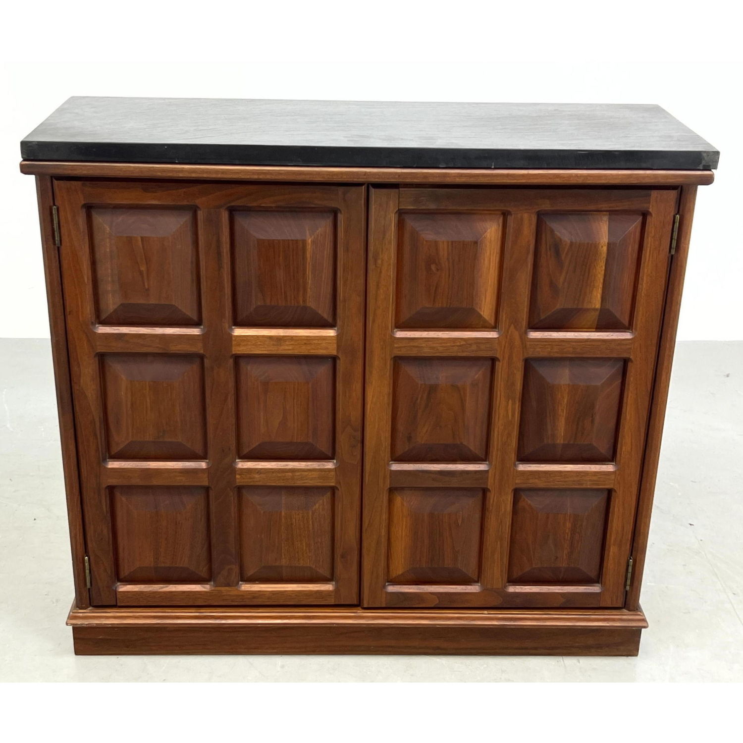Walnut Two Door Cabinet. Faceted