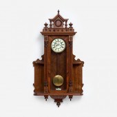WALNUT WALL CLOCK, CA. 1900An