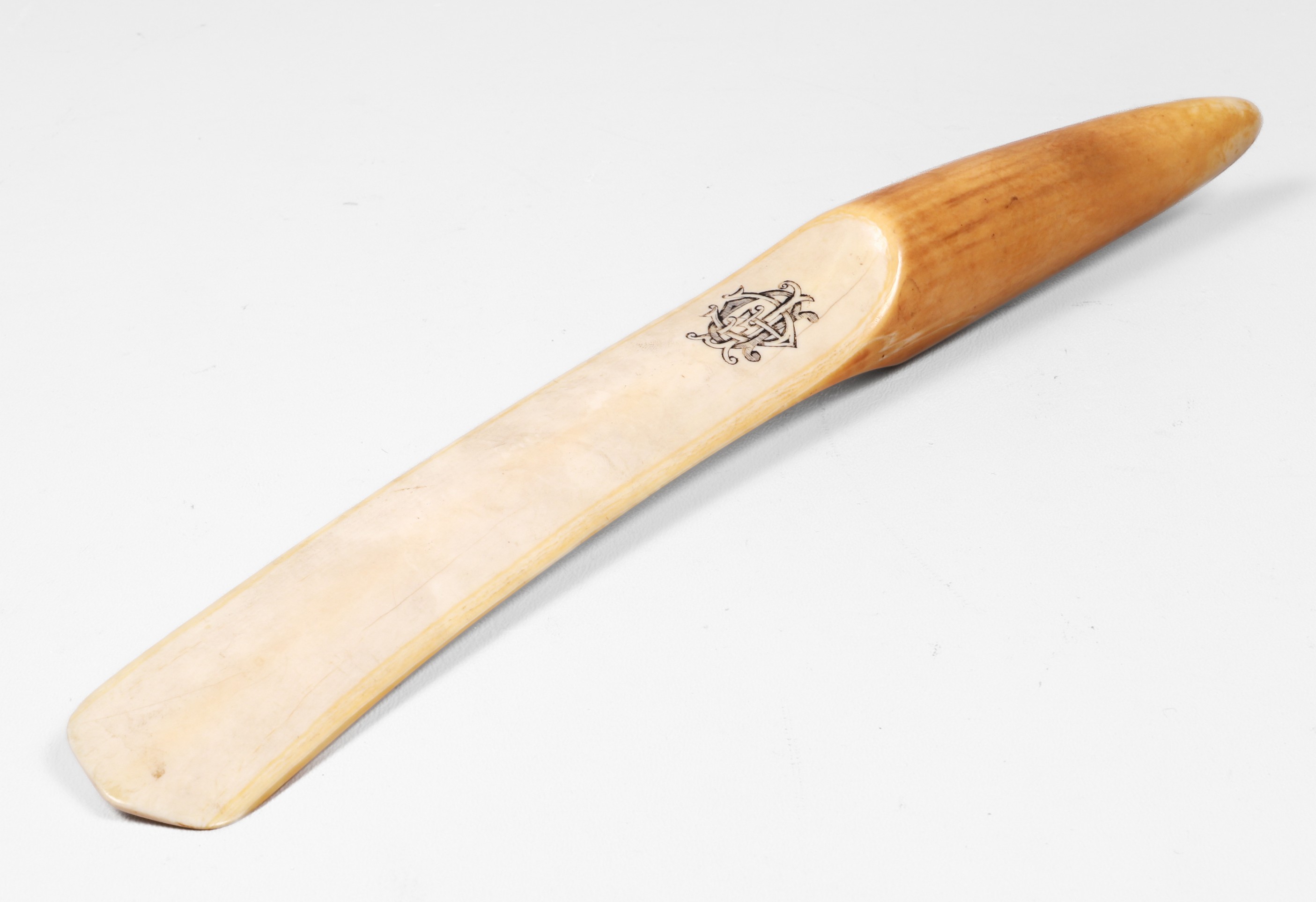 Walrus tusk page turner, shaped