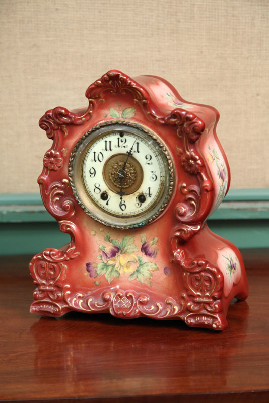 WATERBURY CHINA MANTLE CLOCK. Eight