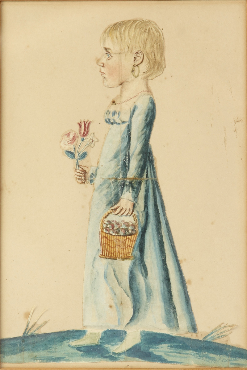 W/C of girl in blue dress w/rose