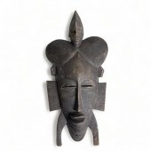 West African carved Kpelie mas