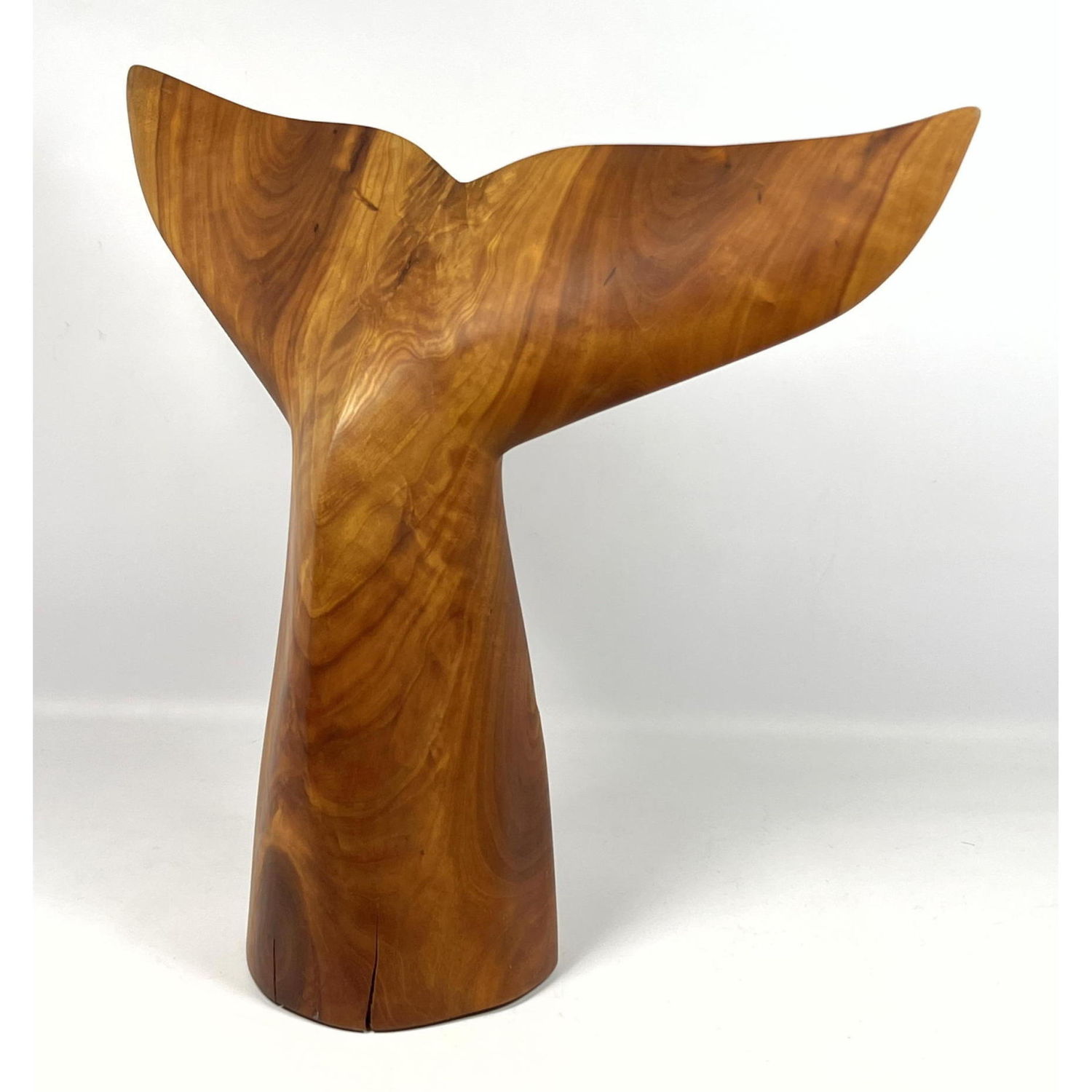 Whale tail sculpture signed J R