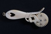 WHALEMAN MADE CARVED HEART HAN
