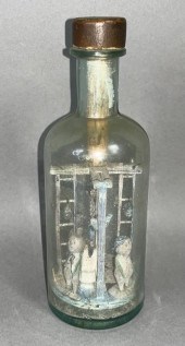 WHIMSY CARVING IN A BOTTLE BY
