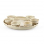 WHITE-GLAZED POTTERY CIRCULAR