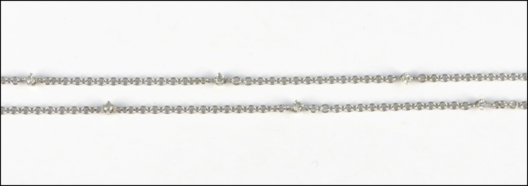 WHITE GOLD AND DIAMOND NECKLACE.