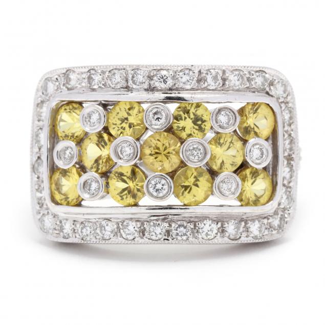WHITE GOLD AND GEM-SET RING In a
