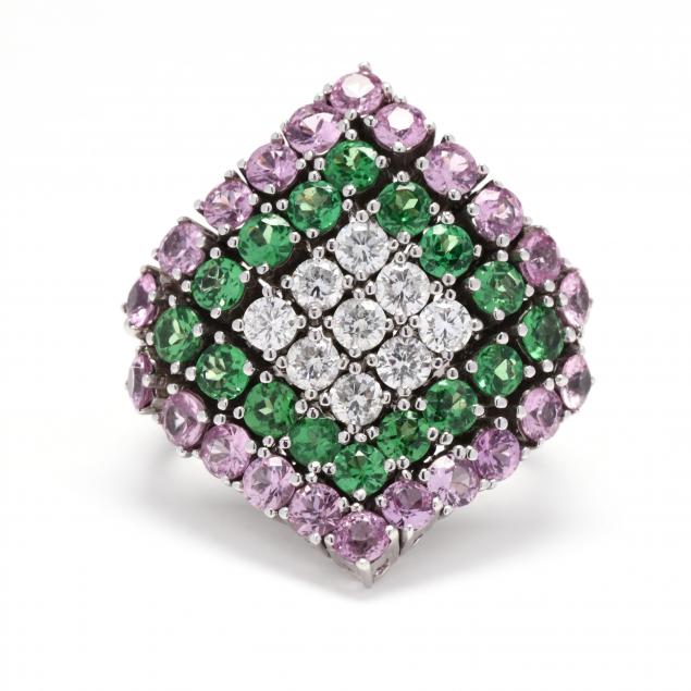 WHITE GOLD AND GEM-SET RING In a