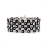 WHITE GOLD, DIAMOND AND ONYX C