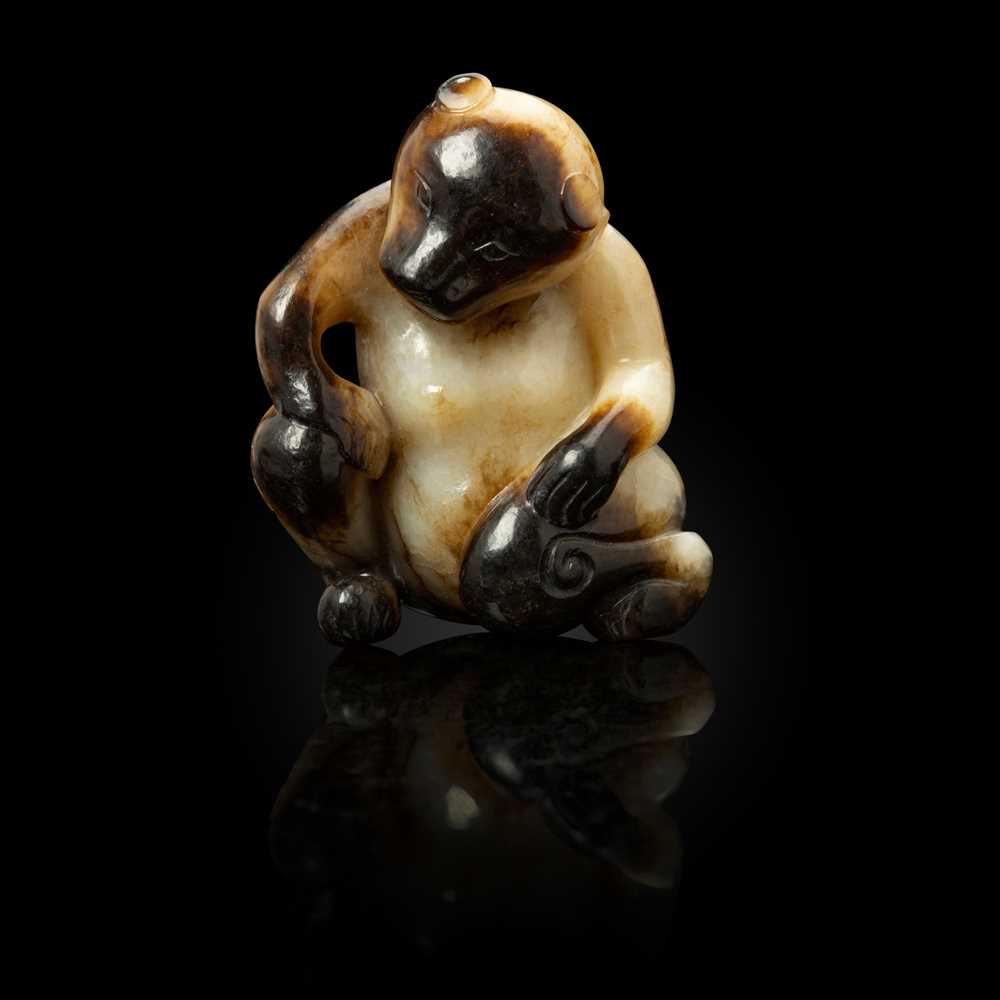 WHITE JADE WITH RUSSET SKIN CARVING