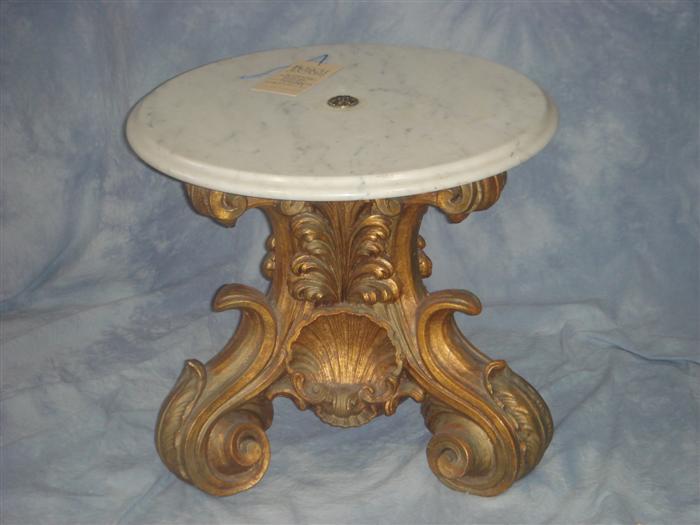 White marble top table on gilt