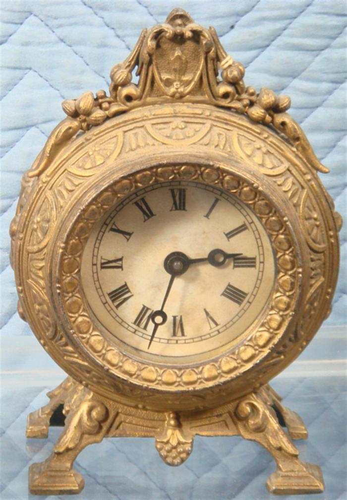 White metal alarm clock, running,