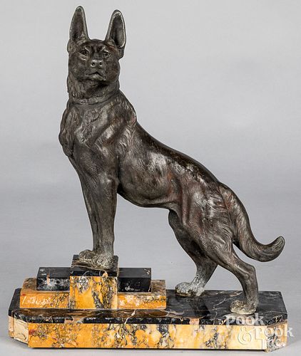 WHITE METAL SCULPTURE OF A DOG,