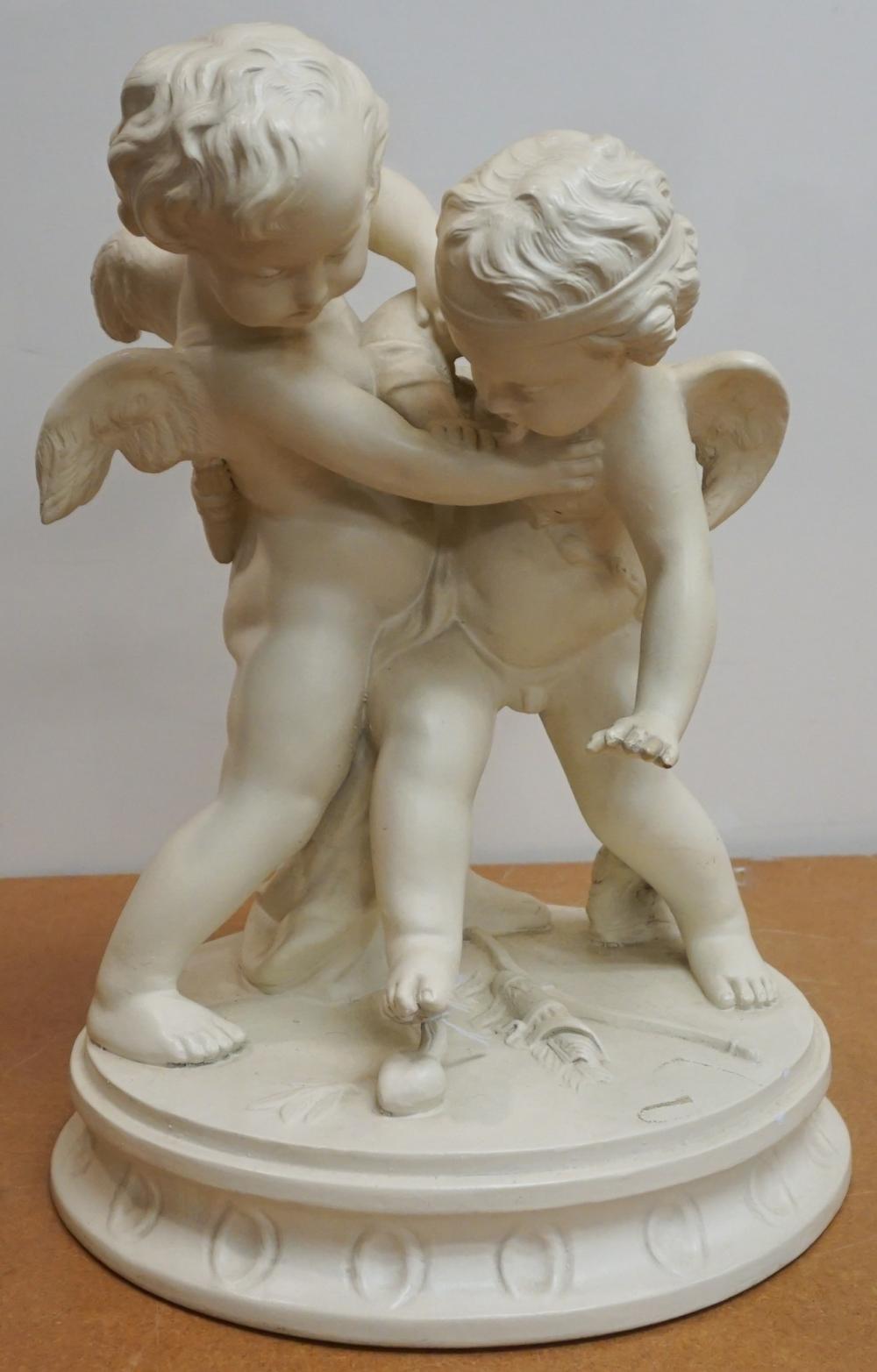 WHITE PAINTED CERAMIC FIGURE OF