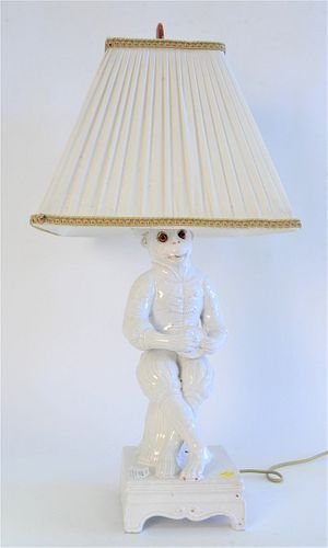 WHITE PORCELAIN CROWNED SEATED