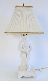 WHITE PORCELAIN CROWNED SEATED