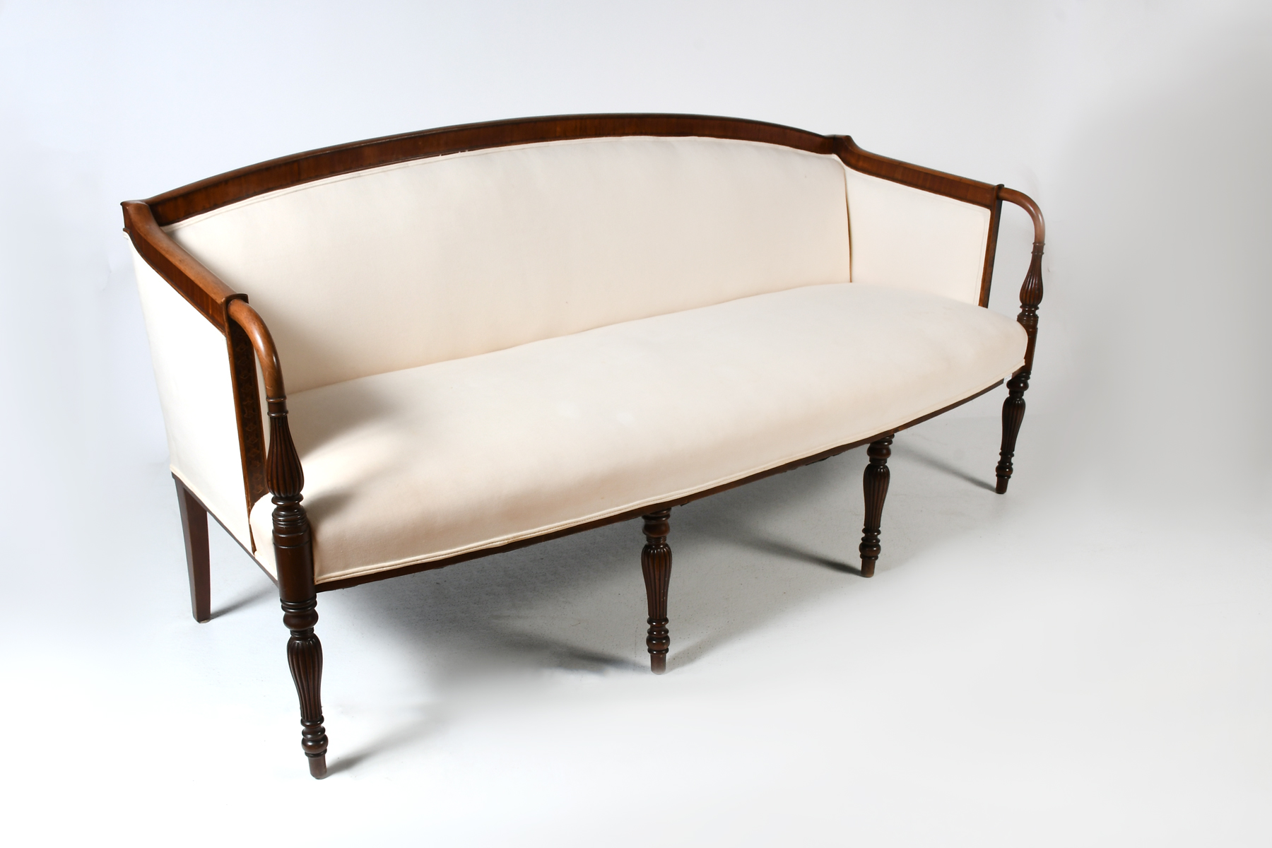 WHITE UPHOLSTERED CAMELBACK SOFA: