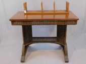 WICKER LIBRARY TABLE, CA. 1900