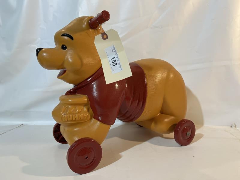 WINNIE THE POOH PLASTIC ROLLING