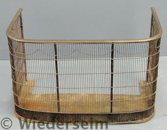 Wire fireplace screen with brass
