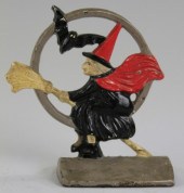 WITCH DOORSTOP Cast iron wedge