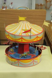 WOLVERINE MERRY-GO-ROUND. Tin