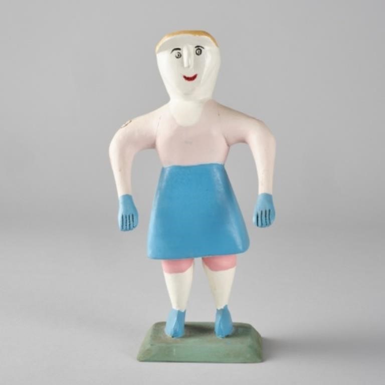 WOMAN CARVING BY CHARLIE TANNERA