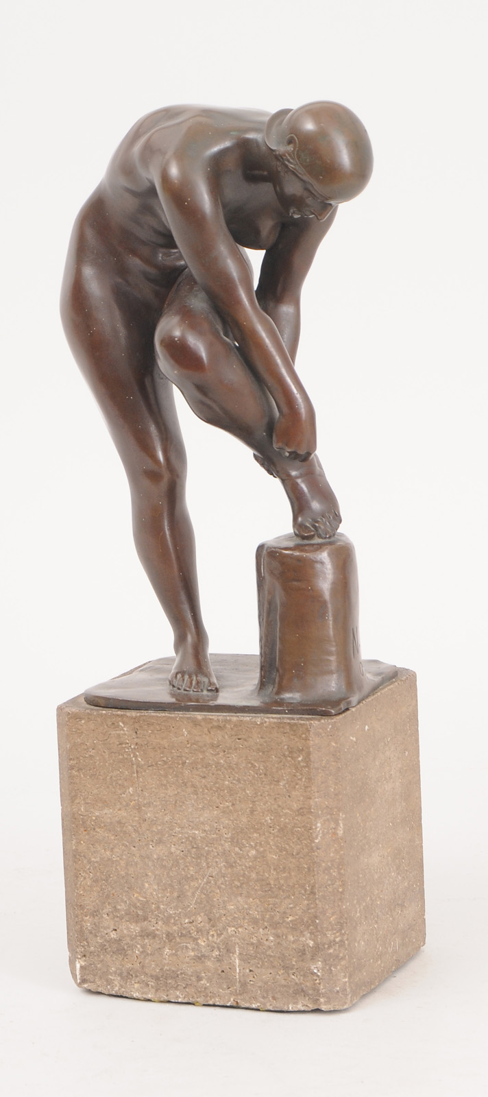 WOMAN FIXING HER SANDAL Bronze