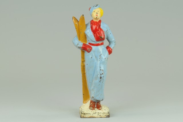 WOMAN SKIER DOORSTOP Full figured