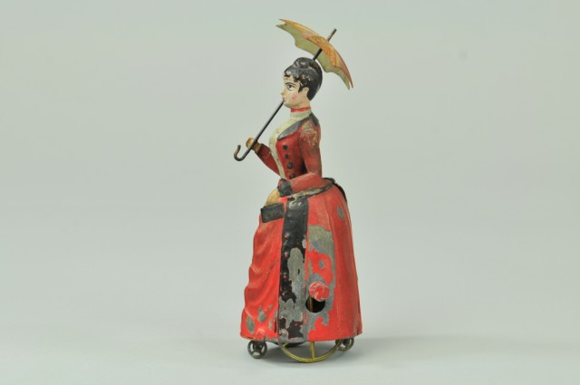 WOMAN WITH UMBRELLA Attributed to