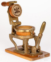 WOOD AND CAST BRASS MECHANICAL