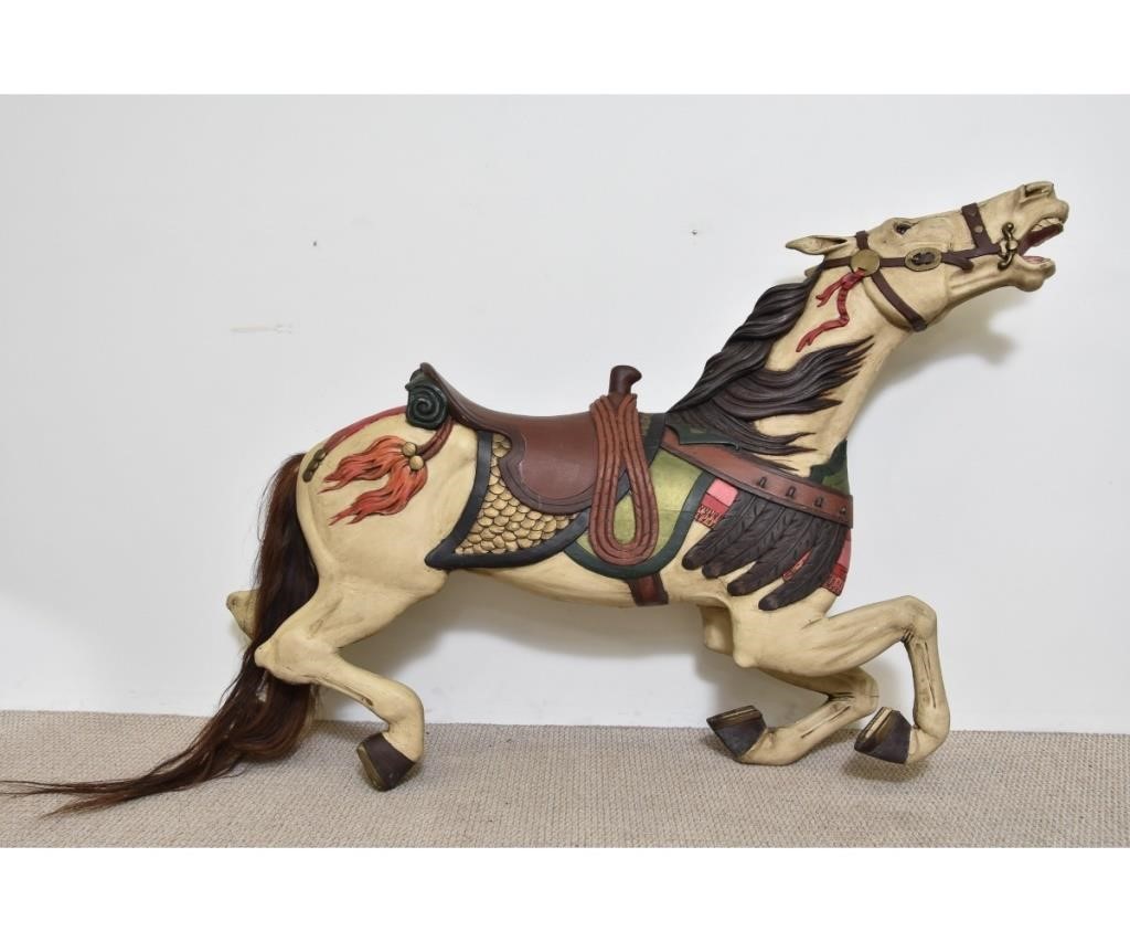Wood carved carousel horse of