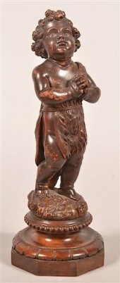 WOOD CARVING OF A PRAYING CHIL