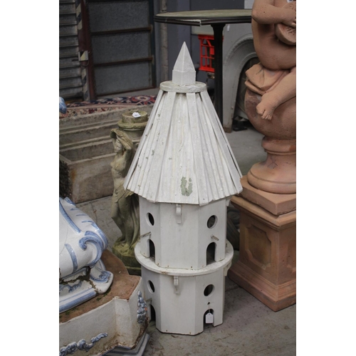 Wooden bird house, approx 110 cm