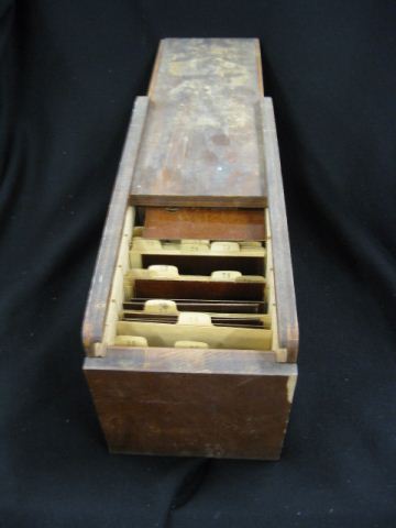 Wooden Box full of old stencils.