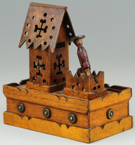 WOODEN FIGURE AT BUILDING