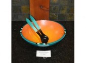 Wooden salad bowl and utensils