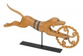 WOODEN SCULPTURE OF A RUNNING