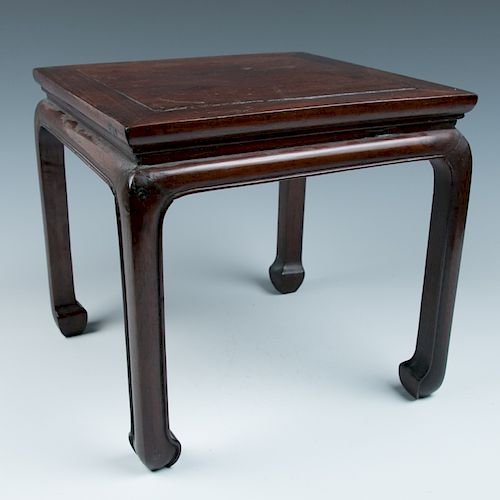 WOODEN STANDA stand with a square